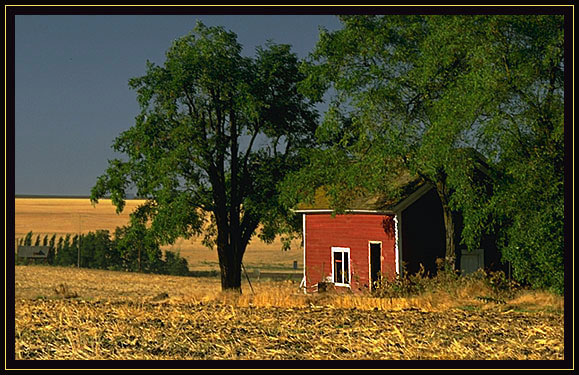 A little red barn on the prairie. Oregon
