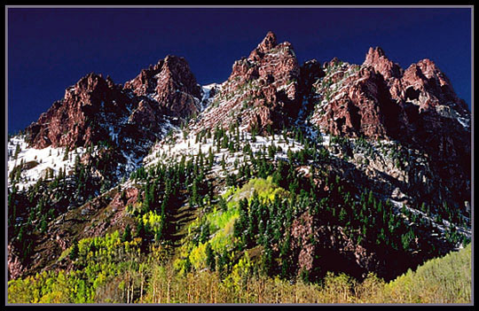 Snow on a red mountain. Colorado